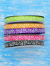 3/8" Glow-In-The-Dark!! Stars on Halloween Solids - BY THE YARD